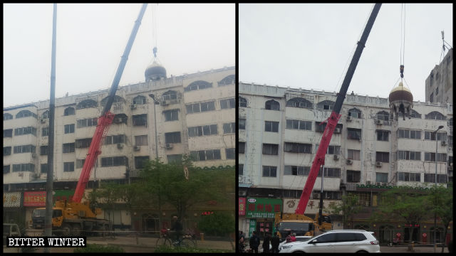 吊車正在拆樓頂的圓形伊斯蘭建築